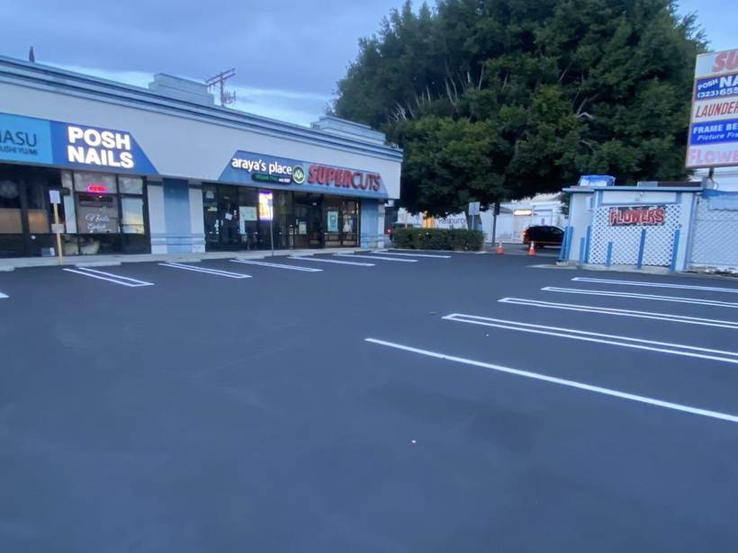 Neighborhood shopping center lot completed during evening phasing