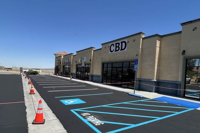 Accessible parking stalls with blue access aisle hatching