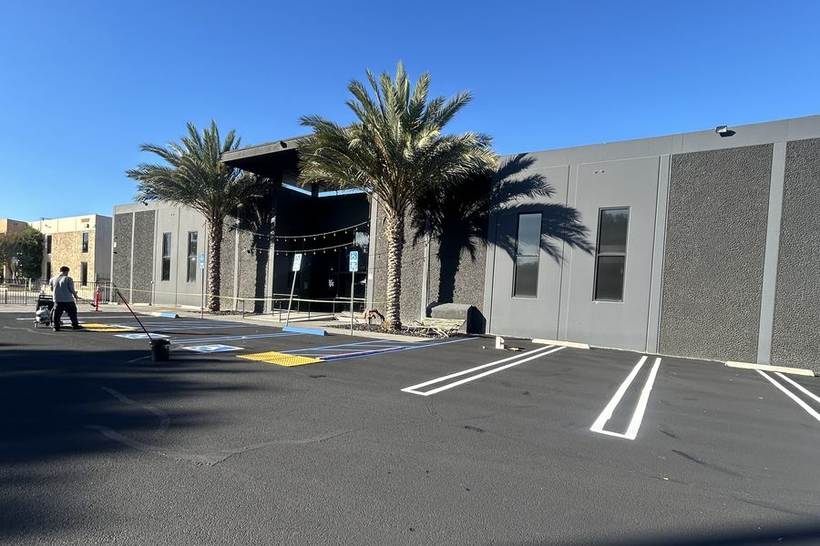 Office industrial property lot after resurfacing and striping