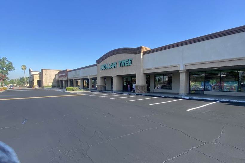 Retail center parking lot after seal coating